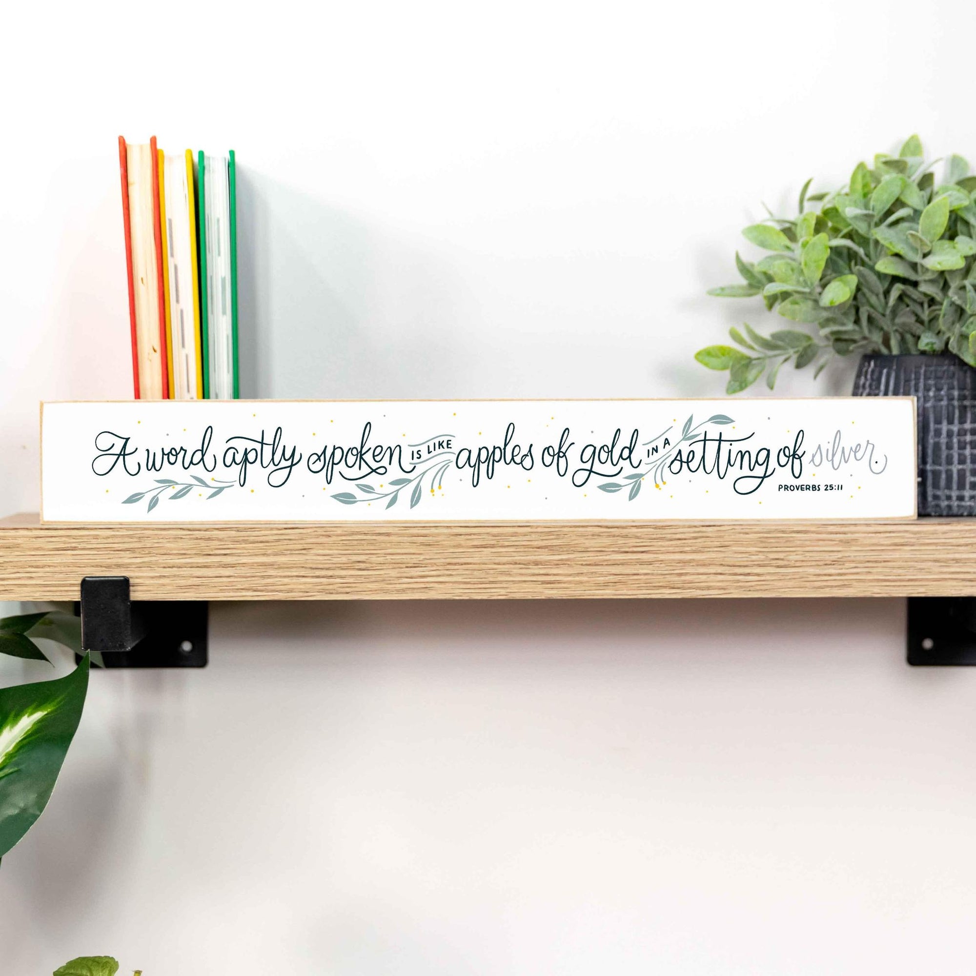 A Word Aptly Spoken Shelf Sign